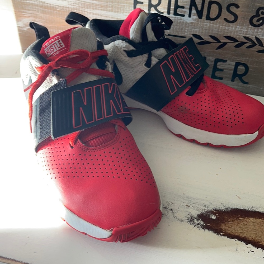 Red and white Nike basketball shoes